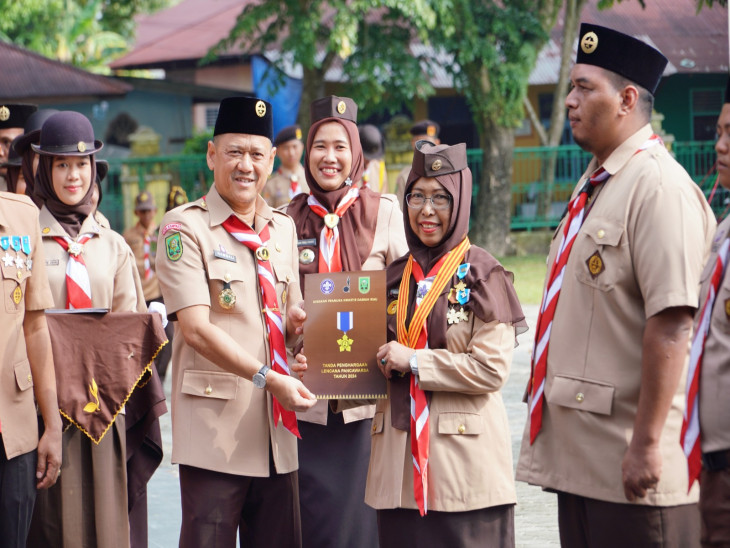 Pj. Bupati Kampar Jadi Pembina Pada Apel Peringatan Hari Pramuka Ke-63 Tahun 2024 Di Kab. Kampar.