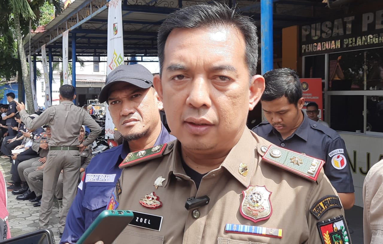 Satpol PP Tindak APK yang Melanggar Perda Kota Pekanbaru